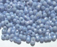 25 grams of 3x7mm Marble Blue Lustre Farfalle Seed Beads